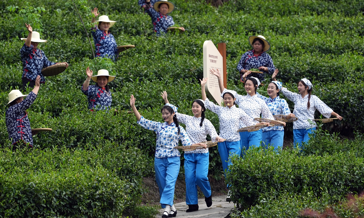 Villagers perform during a local event celebrating the spring tea season in Shuimo town in Southwest China's Sichuan Province on April 20, 2025. Through immersive folk experiences and innovative integration of culture and tourism, the event is expected to boost local tea-industry revitalization. Photo: VCG