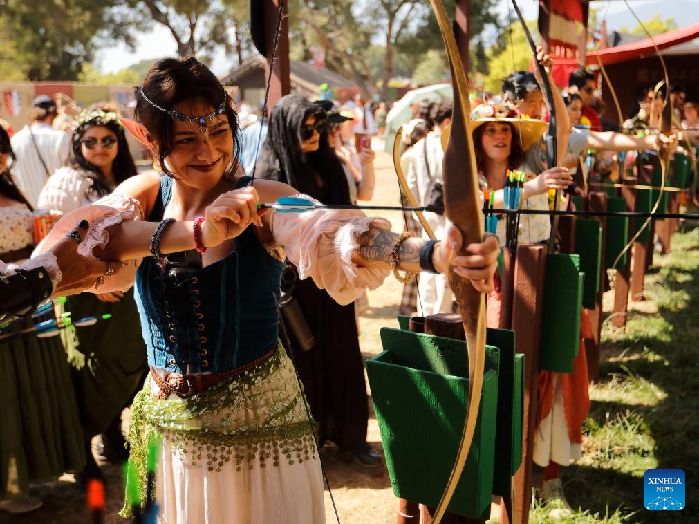 People practice archery during the Renaissance Pleasure Faire in Irwindale, Los Angeles County, the United States, on April 20, 2025. (Photo: Xinhua)