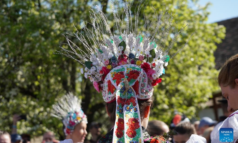 Women in traditional costumes celebrate Easter in Holloko, Hungary, on April 21, 2025. (Photo: Xinhua)