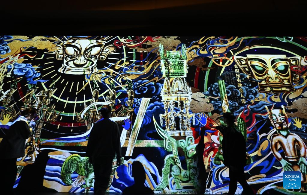 People visit an immersive art exhibition of Sanxingdui at National Maritime Museum of China in north China's Tianjin, April 22, 2025. (Photo: Xinhua)