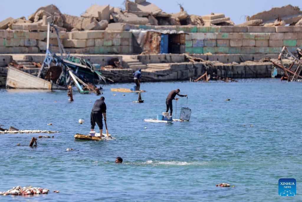 Palestinian fishermen are pictured at the Gaza port in Gaza City, on April 20, 2025. (Photo: Xinhua)