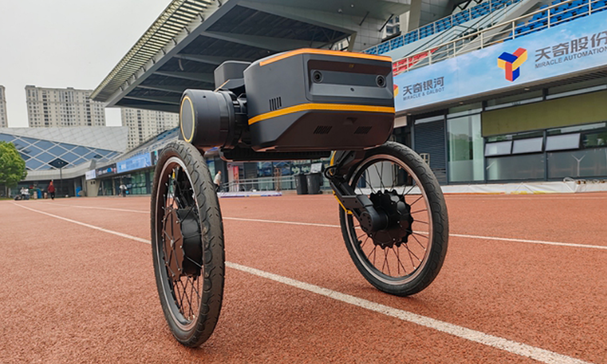 A wheeled bipedal robotic, TITA Robot, developed by Dongguan-based Direct Drive Technology, prepares for the robot off-road race in the playground in Wuxi, East China's Jiangsu Province, on April 24, 2025. Photo: Courtesy of Direct Drive Technology