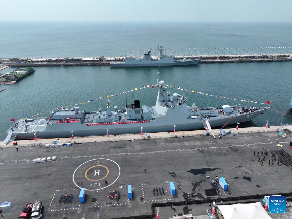 An aerial drone photo shows people participating in a naval vessel open day event to mark the 76th anniversary of the Chinese People's Liberation Army (PLA) Navy in Qingdao, east China's Shandong Province, April 22, 2025. The Chinese People's Liberation Army (PLA) Navy marked its 76th anniversary on Wednesday, reaffirming its commitment to becoming a world-class naval force dedicated to safeguarding both national security and global peace. (Photo: Xinhua)