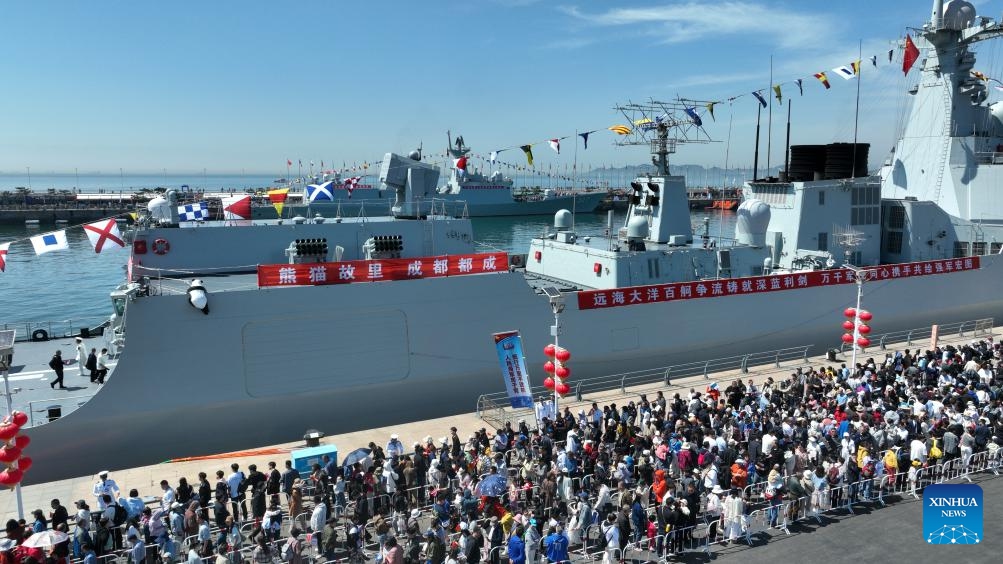 An aerial drone photo shows people participating in a naval vessel open day event to mark the 76th anniversary of the Chinese People's Liberation Army (PLA) Navy in Qingdao, east China's Shandong Province, April 22, 2025. The Chinese People's Liberation Army (PLA) Navy marked its 76th anniversary on Wednesday, reaffirming its commitment to becoming a world-class naval force dedicated to safeguarding both national security and global peace. (Photo: Xinhua)