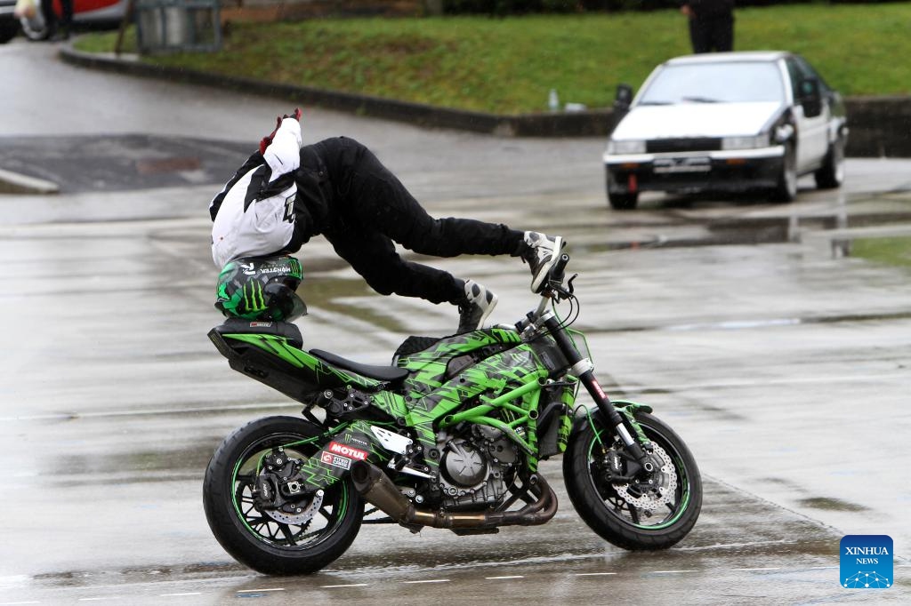 A stunt rider performs on a motorbike during the Stunt Festival in Karlovac, Croatia, April 25, 2025. (Photo: Xinhua)
