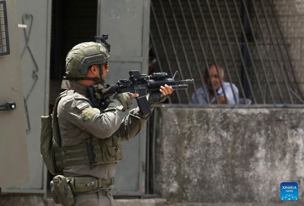 An Israeli soldier is seen during a military operation in the Balata refugee camp, east of Nablus in the northern West Bank, on April 24, 2025. (Photo: Xinhua)
