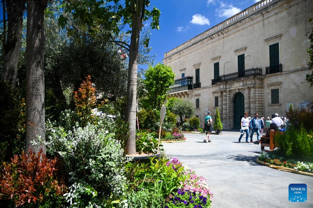 People visit St. George's Square decorated with plants during the Valletta Green Festival in Valletta, Malta, April 25, 2025. This year's festival kicked off here on Friday and will last until May 4. (Photo: Xinhua)