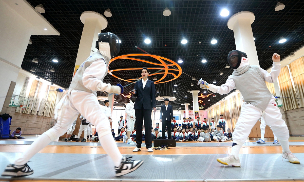 Students participate in a fencing competition at a school in Qingdao, East China's Shandong Province on April 27, 2025. In recent years, some schools in China have introduced fencing programs as part of efforts to promote well-rounded education, with students learning fencing etiquette, footwork and combat skills under the guidance of instructors. Photo: VCG