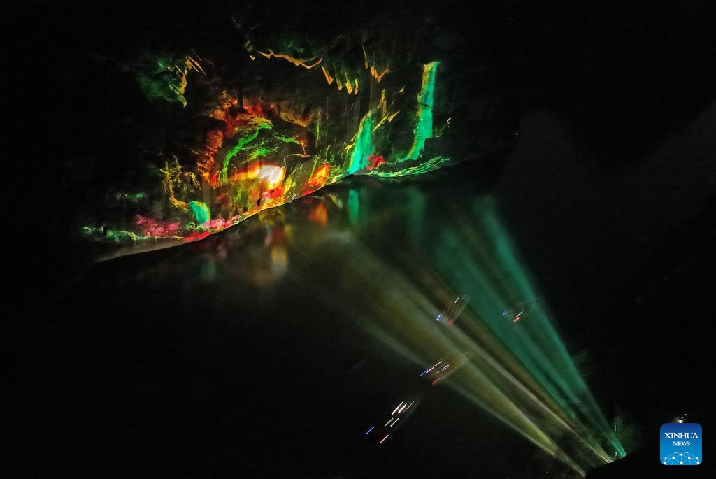 An aerial drone photo taken on March 24, 2025 shows an on-site performance staged at the Longhu Mountain scenic area in Yingtan, east China's Jiangxi Province. Titled UNESCO Global Geopark, Longhu Mountain of Jiangxi Province is a natural site on World Heritage List and one of the birthplaces of Taoism in China. Taoism, or Daoism, is a 2,000-year-old religion that originated from Laozi's philosophy. Its key doctrines include seeking harmony with the eternal cosmic order known as Dao and cherishing one's life. (Photo: Xinhua)