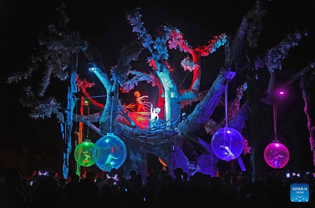 Tourists enjoy an on-site performance at the Longhu Mountain scenic area in Yingtan, east China's Jiangxi Province, March 24, 2025. Titled UNESCO Global Geopark, Longhu Mountain of Jiangxi Province is a natural site on World Heritage List and one of the birthplaces of Taoism in China. Taoism, or Daoism, is a 2,000-year-old religion that originated from Laozi's philosophy. Its key doctrines include seeking harmony with the eternal cosmic order known as Dao and cherishing one's life. (Photo: Xinhua)