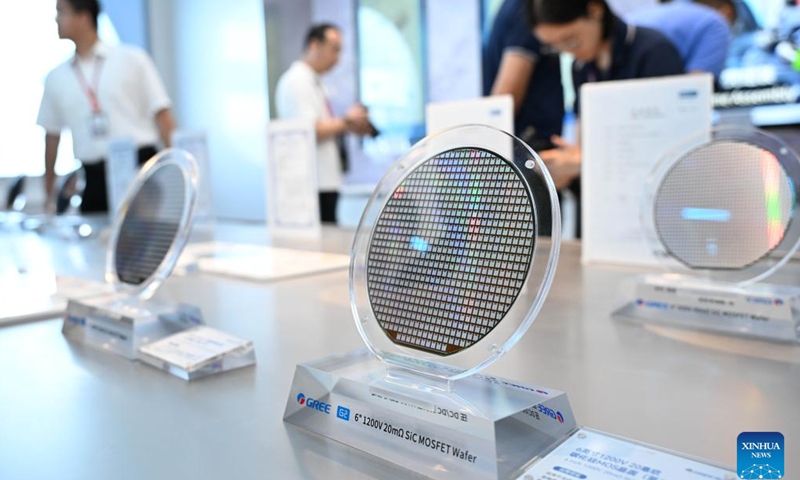 Six-inch silicon carbide wafers are pictured at a company of Gree Electric Appliances Inc. of Zhuhai in south China's Guangdong Province, April 29, 2025.