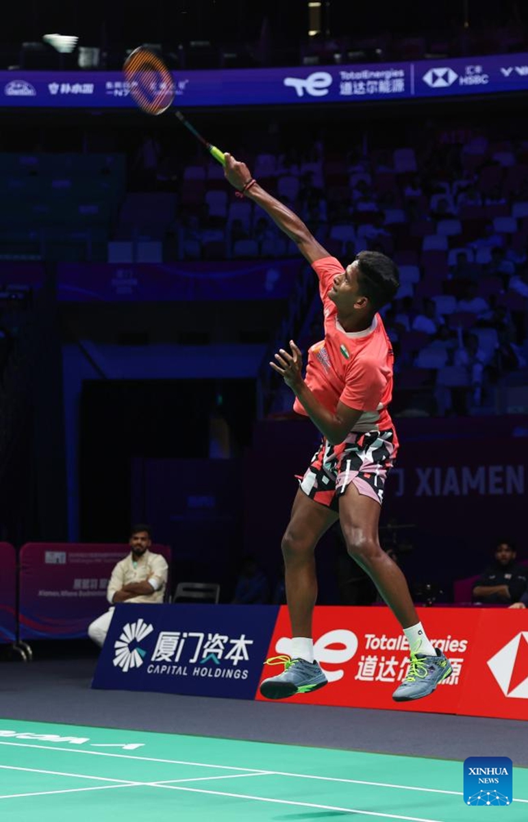 Sathish Kumar Karunakaran of India hits a return during the men's singles match against Harry Huang of England of the Group D match between India and England at BWF Sudirman Cup in Xiamen, southeast China's Fujian Province, May 1, 2025. Photo: Xinhua