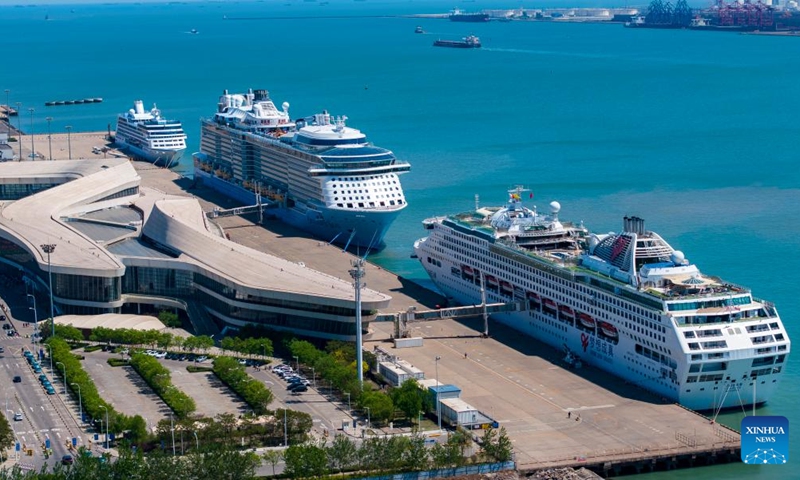 An aerial drone photo shows three cruise ships berthing at Tianjin International Cruise Home Port in north China's Tianjin Municipality, May 1, 2025. Tianjin International Cruise Home Port welcomed the simultaneous berthing of three international cruise ships on the first day of May Day holiday, which was the first time since its resumption of operations. According to statistics, on May 1, the number of inbound and outbound passengers reached nearly 15,000, with over 400 travelers applying for visa-free entry with a period of 240 hours. Photo: Xinhua