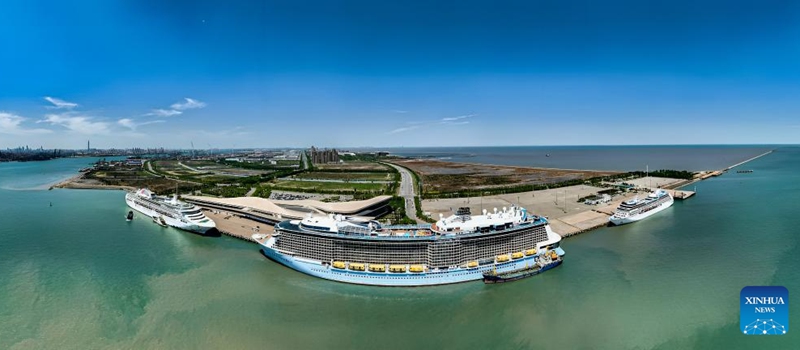 An aerial drone photo shows three cruise ships berthing at Tianjin International Cruise Home Port in north China's Tianjin Municipality, May 1, 2025. Tianjin International Cruise Home Port welcomed the simultaneous berthing of three international cruise ships on the first day of May Day holiday, which was the first time since its resumption of operations. According to statistics, on May 1, the number of inbound and outbound passengers reached nearly 15,000, with over 400 travelers applying for visa-free entry with a period of 240 hours. Photo: Xinhua