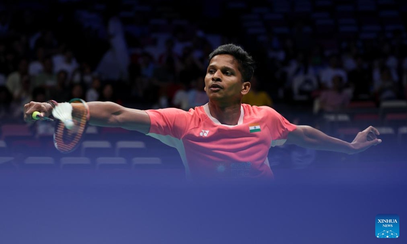 Sathish Kumar Karunakaran of India hits a return during the men's singles match against Harry Huang of England of the Group D match between India and England at BWF Sudirman Cup in Xiamen, southeast China's Fujian Province, May 1, 2025. Photo: Xinhua