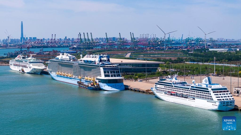 An aerial drone photo shows three cruise ships berthing at Tianjin International Cruise Home Port in north China's Tianjin Municipality, May 1, 2025. Tianjin International Cruise Home Port welcomed the simultaneous berthing of three international cruise ships on the first day of May Day holiday, which was the first time since its resumption of operations. According to statistics, on May 1, the number of inbound and outbound passengers reached nearly 15,000, with over 400 travelers applying for visa-free entry with a period of 240 hours. Photo: Xinhua