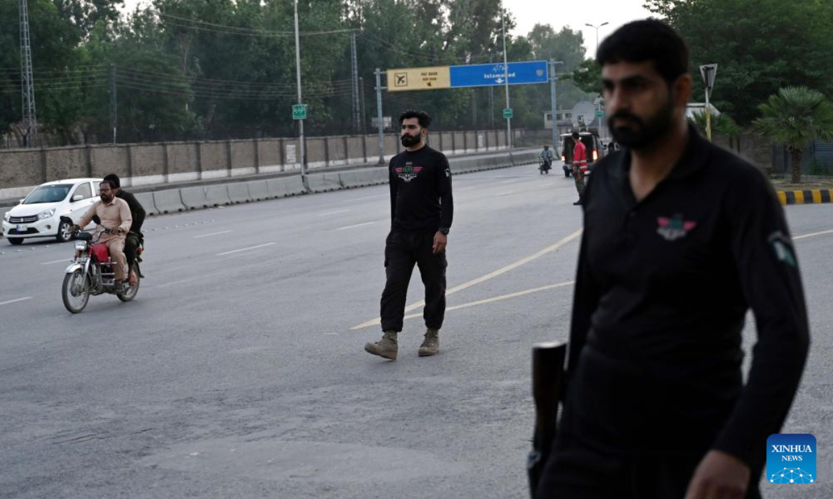 Security personnel patrol on a road leading to Nur Khan Air Base following Indian missile strike in Rawalpindi, Pakistan, May 10, 2025. India launched missile and drone strikes in multiple areas of Pakistan, including three airbases of the Pakistan Air Force (PAF), and also resorted to unprovoked firing along the international border in eastern Punjab province, Pakistani officials and sources confirmed in the wee hours of Saturday. (Xinhua)