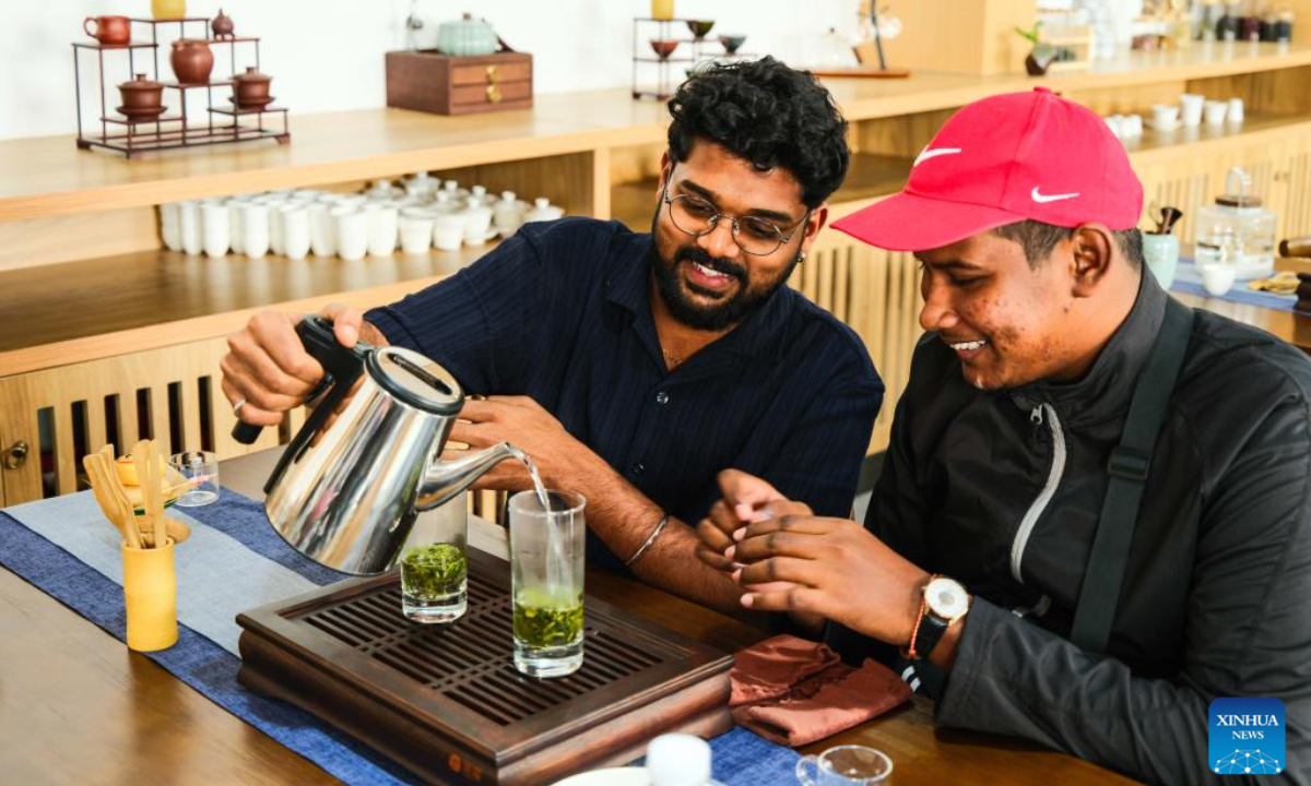 Students from University of Malaysia Sarawak (UNIMAS) learn to make tea at Vocational and Technical College of Inner Mongolia Agricultural University in Baotou, north China's Inner Mongolia Autonomous Region, May 9, 2025. A total of 21 UNIMAS students on Friday attended here hands-on studio workshops featuring traditional Chinese culture and technical training. (Xinhua/Ma Jinrui)