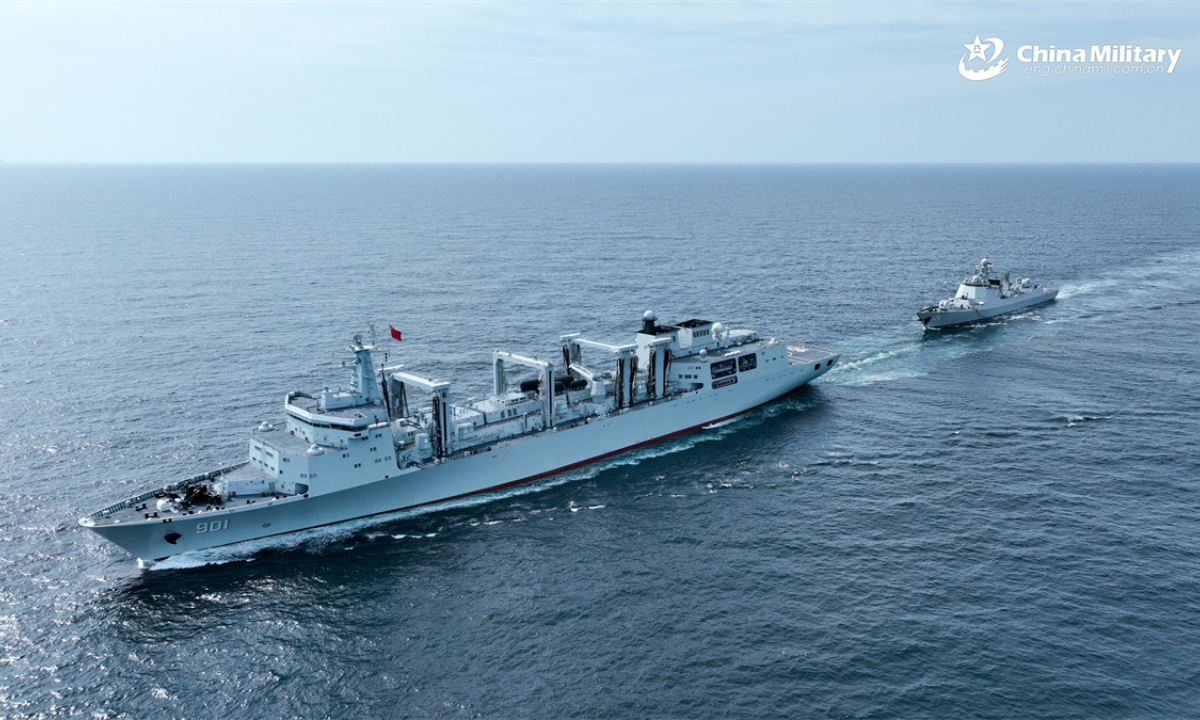 The comprehensive supply ship Hulunhu (Hull 901) attached to a combat support ship flotilla with the navy under the Chinese PLA Northern Theater Command practices astern replenishment-at-sea with the guided-missile destroyer Kaifeng (Hull 124) during a multi-subject training exercise in late April, 2025. (eng.chinamil.com.cn/Photo by Xu Taotao)