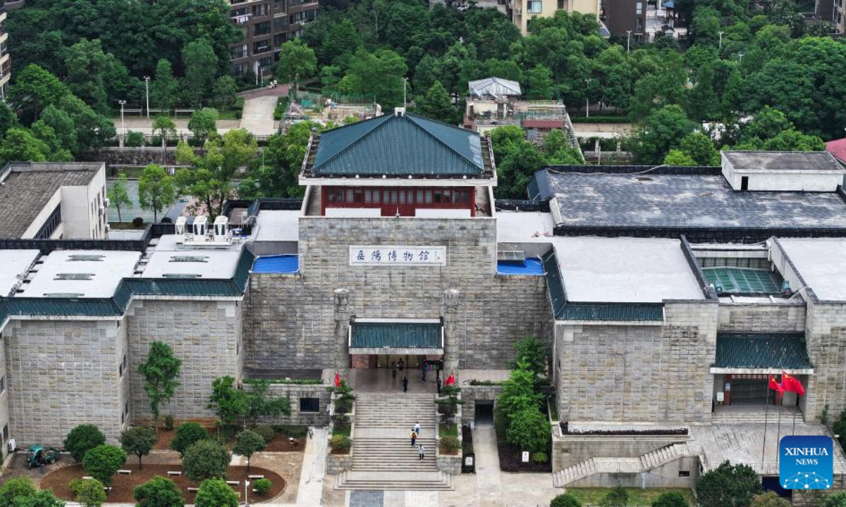 An aerial drone photo shows an exterior view of Yueyang Museum in Yueyang City, central China's Hunan Province, May 10, 2025. Yueyang Museum reopened to the public on Saturday after a temporary closure for renovation of space layout and exhibition area in the museum since Feb. 19, 2025. (Xinhua/Chen Zhenhai)