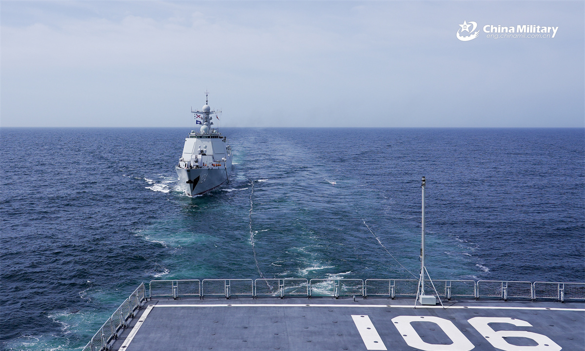 The comprehensive supply ship Hulunhu (Hull 901) attached to a combat support ship flotilla with the navy under the Chinese PLA Northern Theater Command practices astern replenishment-at-sea with the guided-missile destroyer Kaifeng (Hull 124) during a multi-subject training exercise in late April, 2025. (eng.chinamil.com.cn/Photo by Xu Taotao)