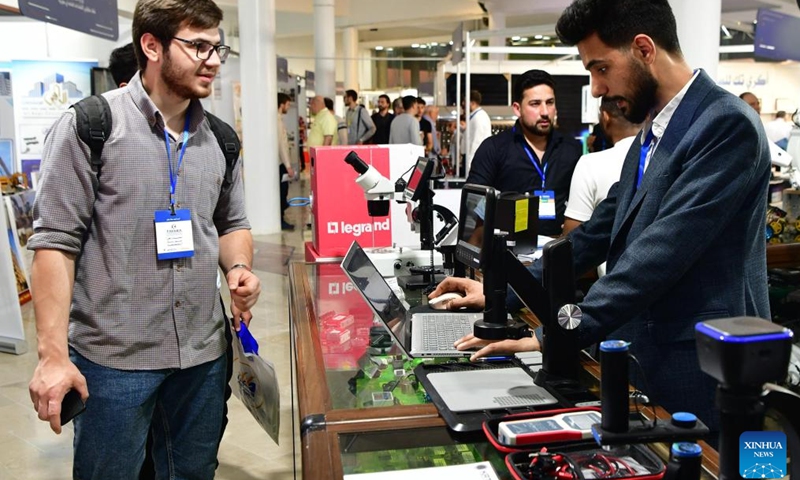 People visit the Syria Energy Expo, a specialized exhibition focused on electricity and energy technologies, at the new Exhibition City grounds in Damascus, Syria, May 8, 2025. The event featuring over 500 local and international companies is part of a broader series of trade fairs. (Photo: Xinhua)