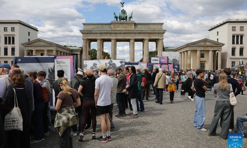 People attend a ceremony commemorating the 80th anniversary of the end of World War II in Europe at the Brandenburg Gate in Berlin, Germany, May 8, 2025. With the unconditional surrender of the Wehrmacht, the unified armed forces of Nazi Germany, World War Two ended on May 8 in 1945 (also known as Victory in Europe Day or VE Day). At least 55 million people had died during the war and around six million Jews had fallen victim to the Nazi's Holocaust throughout Europe. (Photo: Xinhua)
