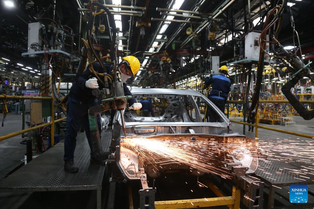 Workers work at an assembling workshop of Kerman Motor in Arg Jadid special economic zone near Bam in Kerman Province, Iran, May 3, 2025. A large number of car manufacturers and auto parts enterprises have built factories at Arg Jadid special economic zone built by the Iranian government. (Photo: Xinhua)
