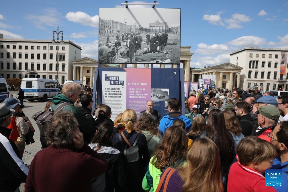 People attend a ceremony commemorating the 80th anniversary of the end of World War II in Europe at the Brandenburg Gate in Berlin, Germany, May 8, 2025. With the unconditional surrender of the Wehrmacht, the unified armed forces of Nazi Germany, World War Two ended on May 8 in 1945 (also known as Victory in Europe Day or VE Day). At least 55 million people had died during the war and around six million Jews had fallen victim to the Nazi's Holocaust throughout Europe. (Photo: Xinhua)