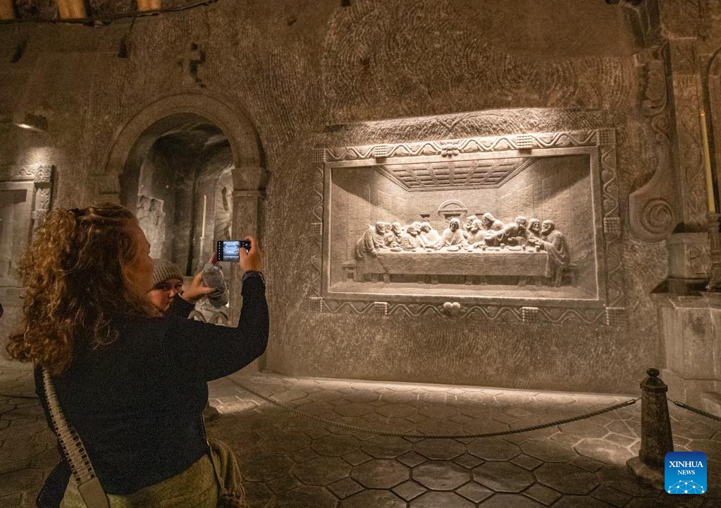 A tourist visits the Wieliczka Salt Mine in Wieliczka, Poland, May 7, 2025. The deposit of rock salt in Wieliczka has been mined since the 13th century. This major industrial undertaking is the oldest of its type in Europe. The Wieliczka Salt Mine illustrates the historic stages of the development of mining techniques in Europe from the 13th to the 20th centuries: the mine has hundreds of kilometers of galleries with works of art, underground chapels and statues sculpted in the salt, making a fascinating pilgrimage into the past. (Photo: Xinhua)