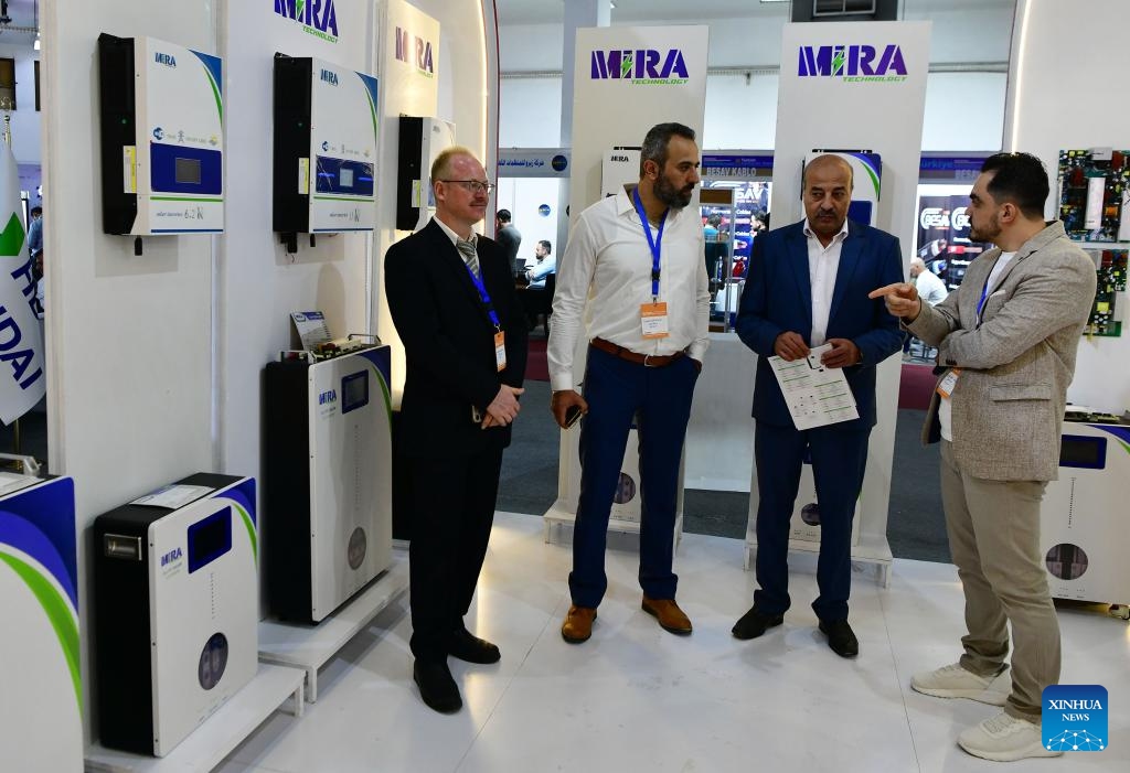 People visit the Syria Energy Expo, a specialized exhibition focused on electricity and energy technologies, at the new Exhibition City grounds in Damascus, Syria, May 8, 2025. The event featuring over 500 local and international companies is part of a broader series of trade fairs. (Photo: Xinhua)