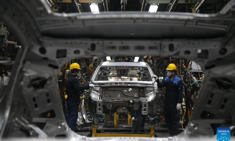 Workers work at an assembling workshop of Kerman Motor in Arg Jadid special economic zone near Bam in Kerman Province, Iran, May 3, 2025. A large number of car manufacturers and auto parts enterprises have built factories at Arg Jadid special economic zone built by the Iranian government. (Photo: Xinhua)