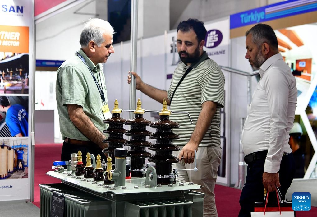 People visit the Syria Energy Expo, a specialized exhibition focused on electricity and energy technologies, at the new Exhibition City grounds in Damascus, Syria, May 8, 2025. The event featuring over 500 local and international companies is part of a broader series of trade fairs. (Photo: Xinhua)