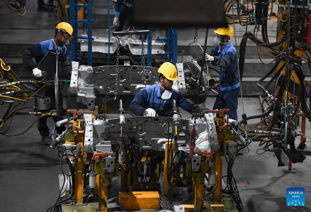 Workers work at an assembling workshop of Kerman Motor in Arg Jadid special economic zone near Bam in Kerman Province, Iran, May 3, 2025. A large number of car manufacturers and auto parts enterprises have built factories at Arg Jadid special economic zone built by the Iranian government. (Photo: Xinhua)