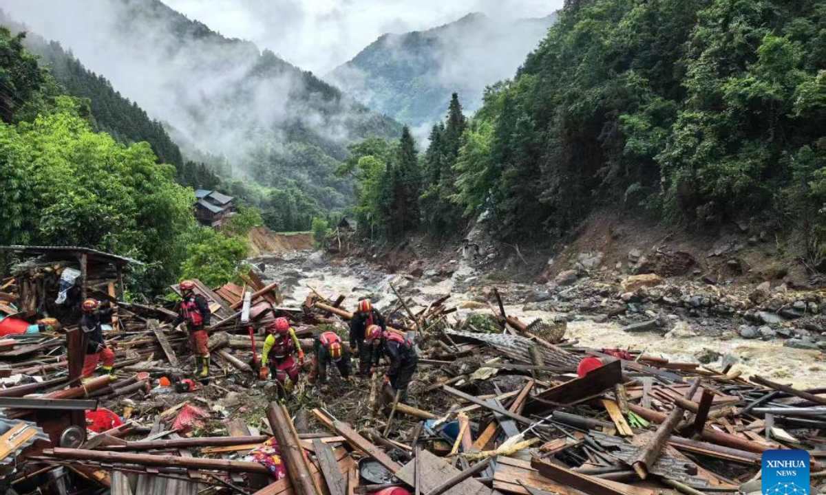 Rescuers work at the site of a mudslide in Longsheng County, Guilin City of south China's Guangxi Zhuang Autonomous Region, on May 23, 2025. A mountain torrent and mudslide struck a village here early Friday morning. Eight people were suspected to be missing, according to preliminary assessment by local authorities. Ten houses sustained damage. Rescue efforts are underway. (Photo by Wei Jiyang/Xinhua)