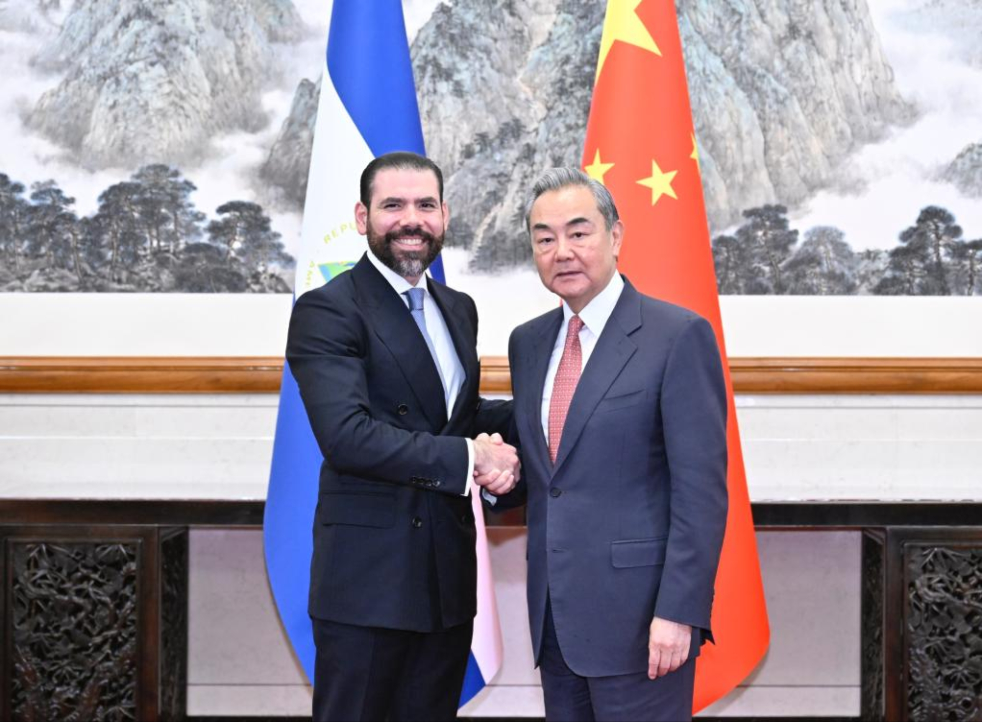 Chinese Foreign Minister Wang Yi, also a member of the Political Bureau of the Communist Party of China Central Committee, shakes hands with Laureano Ortega Murillo, presidential adviser of Nicaragua, in Beijing, capital of China, May 12, 2025. Wang met with Laureano Ortega Murillo and Valdrack Ludwing Jaentschke Whitaker, minister for foreign affairs of Nicaragua, here on Monday. (Xinhua/Yue Yuewei)