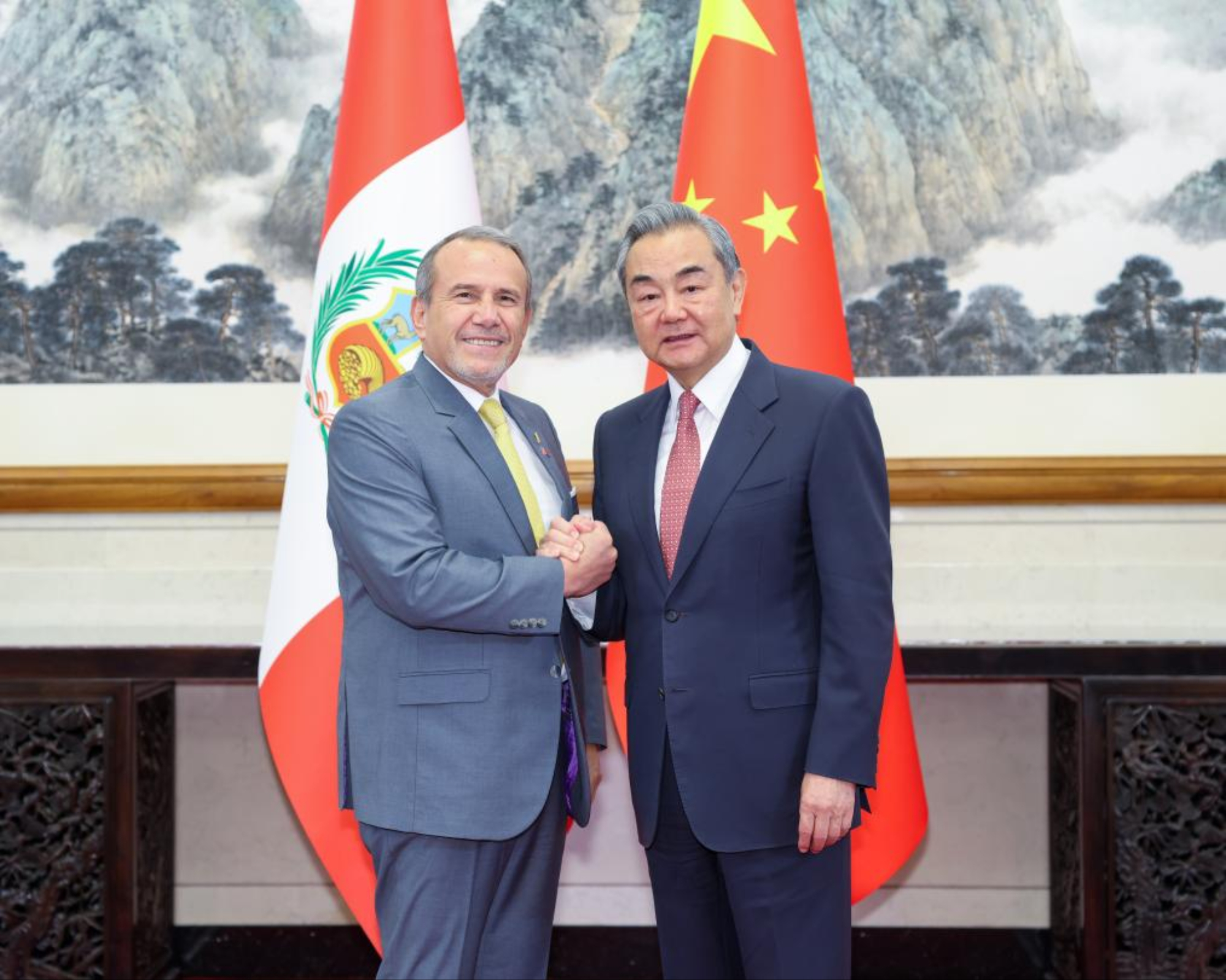 Chinese Foreign Minister Wang Yi, also a member of the Political Bureau of the Communist Party of China Central Committee, meets with Peruvian Foreign Minister Elmer Schialer Salcedo in Beijing, capital of China, May 12, 2025. (Xinhua/Liu Bin)