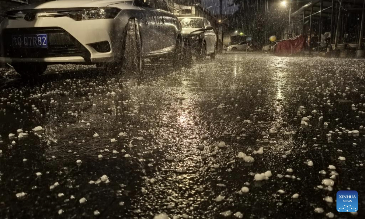 This photo taken on May 13, 2025 shows the hailstones in Xicheng District, Beijing, capital of China. Parts of Beijing saw strong winds and thunderstorms on Tuesday. (Xinhua/Li He)
