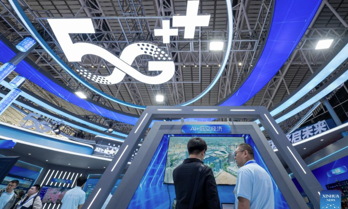 People visit the 34th Harbin International Economic and Trade Fair in Harbin, capital of northeast China's Heilongjiang Province, May 19, 2025. The fair showcased cutting-edge technologies such as autonomous driving, commercial satellites and humanoid robots from over 100 tech firms. (Xinhua/Zhang Tao)