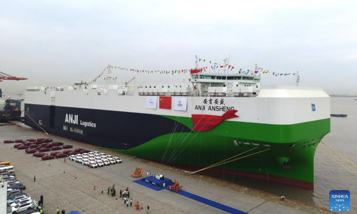 An aerial drone photo taken on May 15, 2025 shows the naming ceremony of the car carrier Anji Ansheng at Shanghai Haitong International Automotive Terminal in east China's Shanghai. (Xinhua/Fang Zhe)