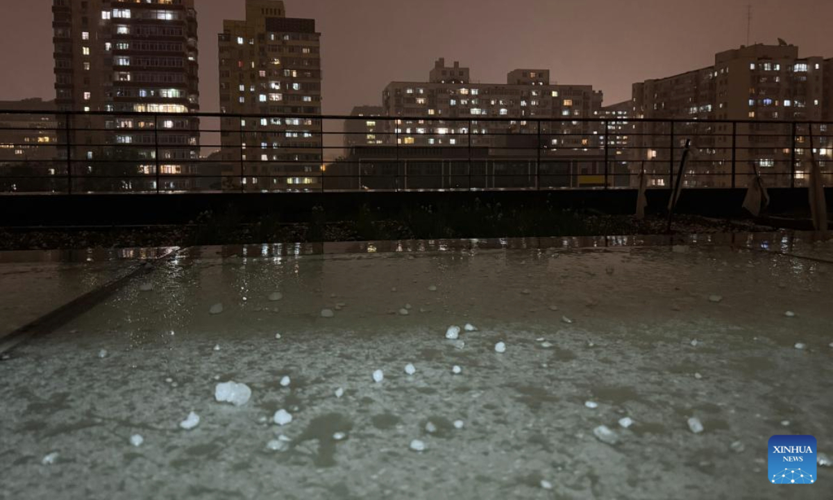This photo taken on May 13, 2025 shows the hailstones in Xicheng District, Beijing, capital of China. Parts of Beijing saw strong winds and thunderstorms on Tuesday. (Xinhua/Cai Yang)
