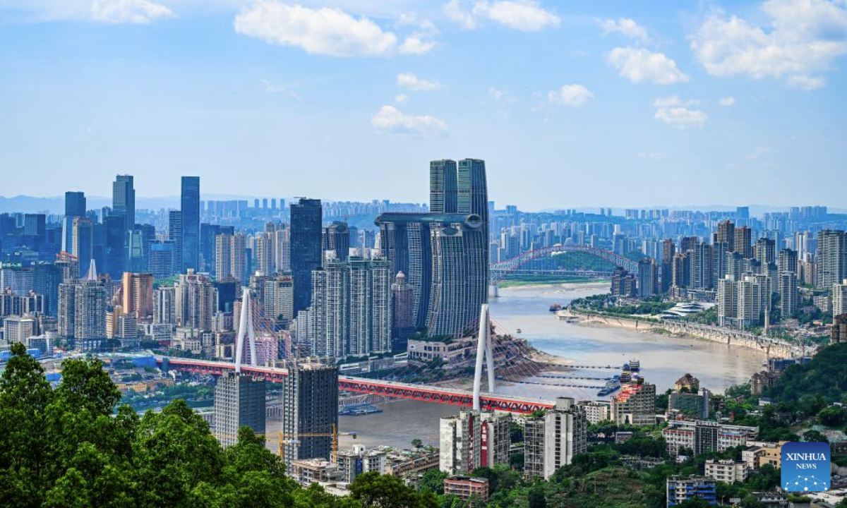 This photo taken on May 22, 2025 shows a view of Chongqing Municipality, southwest China. In recent years, Chongqing has revitalized its riverfronts along the Yangtze and Jialing Rivers, integrating nature and urban development to showcase its iconic landscape featuring mountains, rivers, cityscape and bridges. (Xinhua/Wang Quanchao)