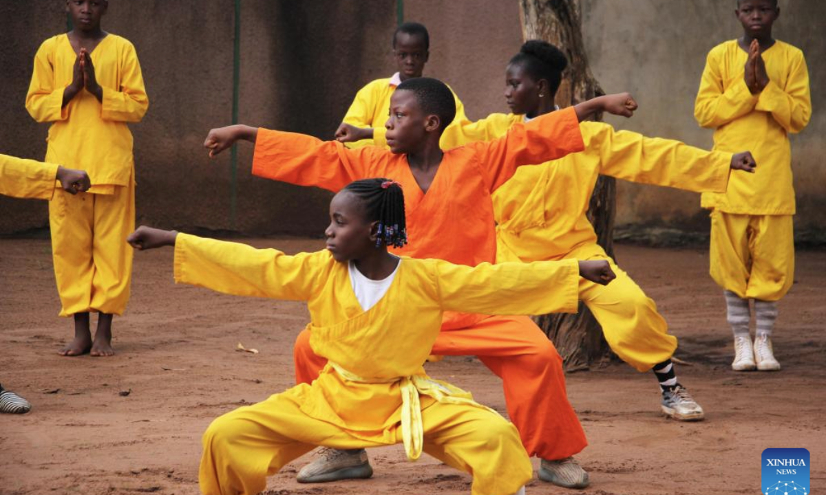 Students practice martial arts at Damien Agossou Degbo's martial arts club in Akpro-Misserete, a town some 40 kilometers northeast of Benin's economic capital Cotonou, on May 18, 2025.(Photo by Seraphin Zounyekpe/Xinhua)