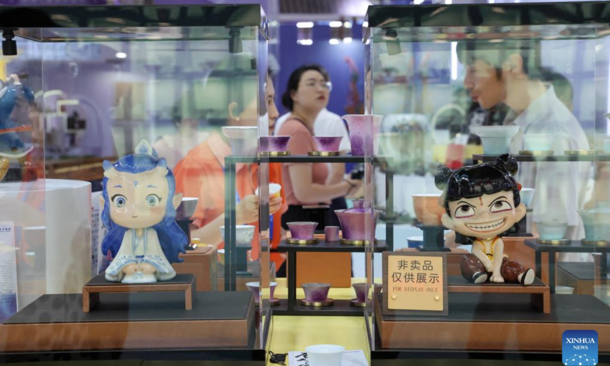 This photo taken on May 22, 2025 shows toys themed on the hit animated film Ne Zha 2 at the 21st China (Shenzhen) International Cultural Industries Fair in Shenzhen, south China's Guangdong Province. The 21st China (Shenzhen) International Cultural Industries Fair opened Thursday in the southern Chinese metropolis of Shenzhen, offering an artificial intelligence (AI) exhibition area for the first time.

The five-day event is being held across eight exhibition halls -- three comprehensive spaces and five specialized areas. The specialized halls cover a broad array of fields, including international cultural trade, cultural tourism, art and design, film and gaming, and intangible cultural heritage. (Xinhua/Liang Xu)