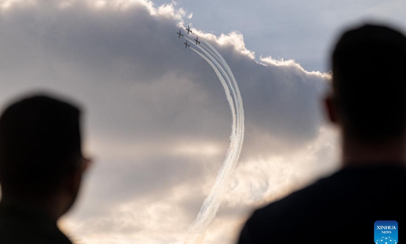 Spectators watch as the Croatian Air Force's aerobatic display team, Wings of Storm, performs during the AIRVG 2025 air show in Velika Gorica, Croatia on May 11, 2025. (Davor Puklavec/PIXSELL via Xinhua)
