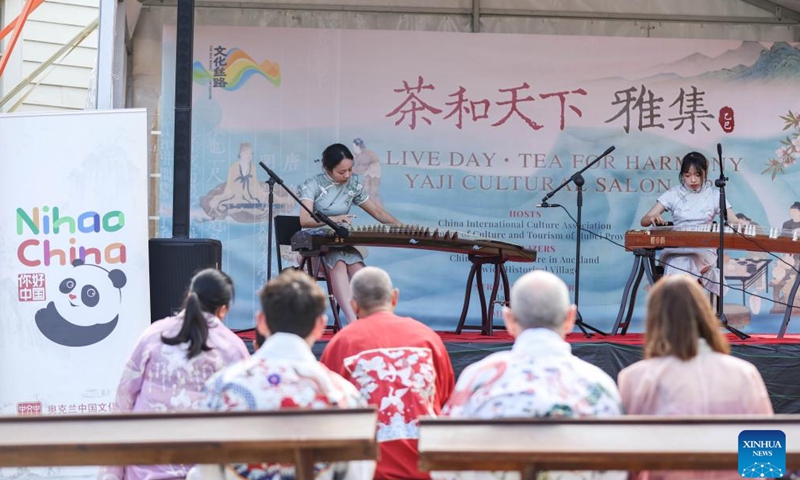 People enjoy Chinese folk music during the Tea for Harmony cultural salon in Auckland, New Zealand, May 11, 2025. The cultural salon on tea was held on Sunday at the picturesque Howick Historical Village in New Zealand's largest city Auckland, inviting guests and local residents to immerse themselves in the richness of traditional Chinese culture while promoting dialogue and friendship between China and New Zealand. (Xinhua/Long Lei)