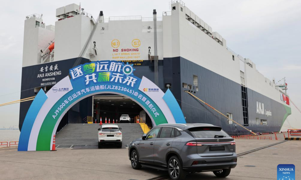 Cars are driven onto the car carrier Anji Ansheng at Shanghai Haitong International Automotive Terminal in east China's Shanghai, May 15, 2025. (Xinhua/Fang Zhe)