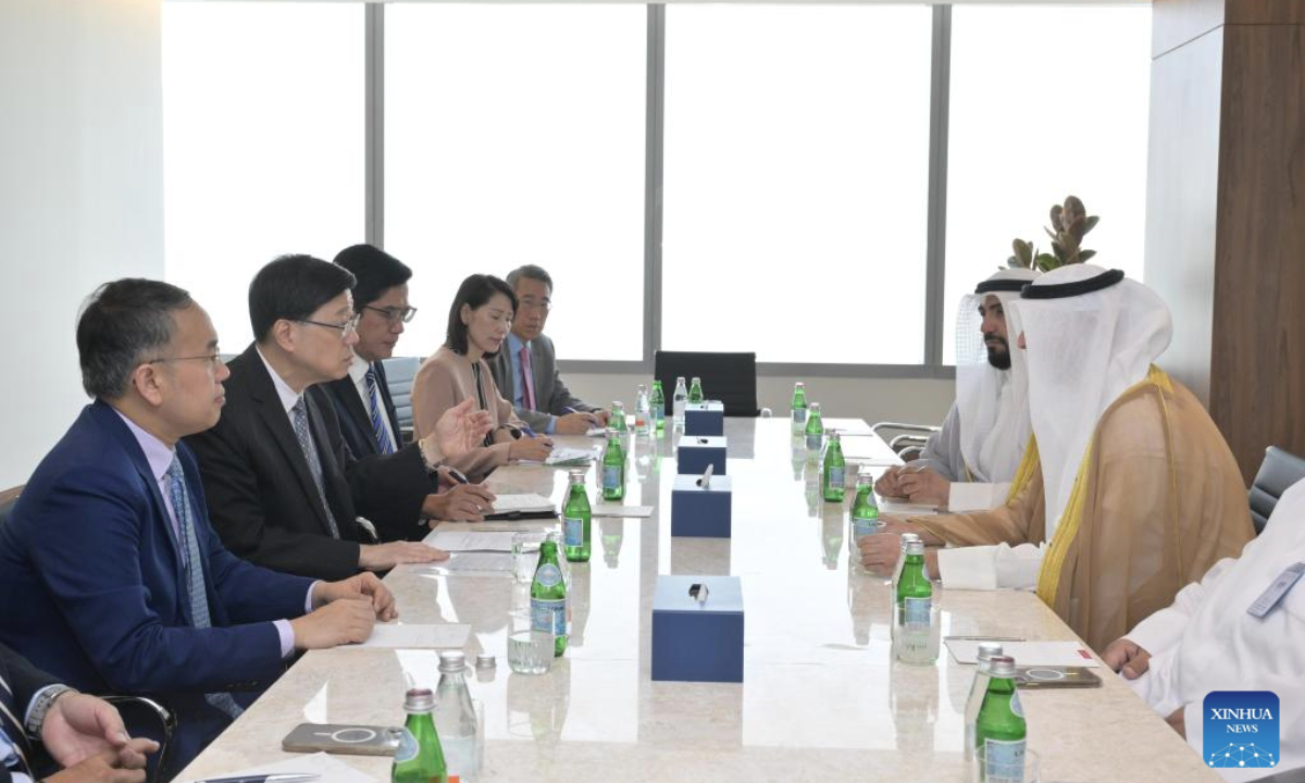 John Lee, chief executive of the Hong Kong Special Administrative Region (HKSAR), meets with representatives of the Kuwait Direct Investment Promotion Authority in Kuwait City, Kuwait, May 14, 2025. (Information Services Department of the Government of the HKSAR/Handout via Xinhua)