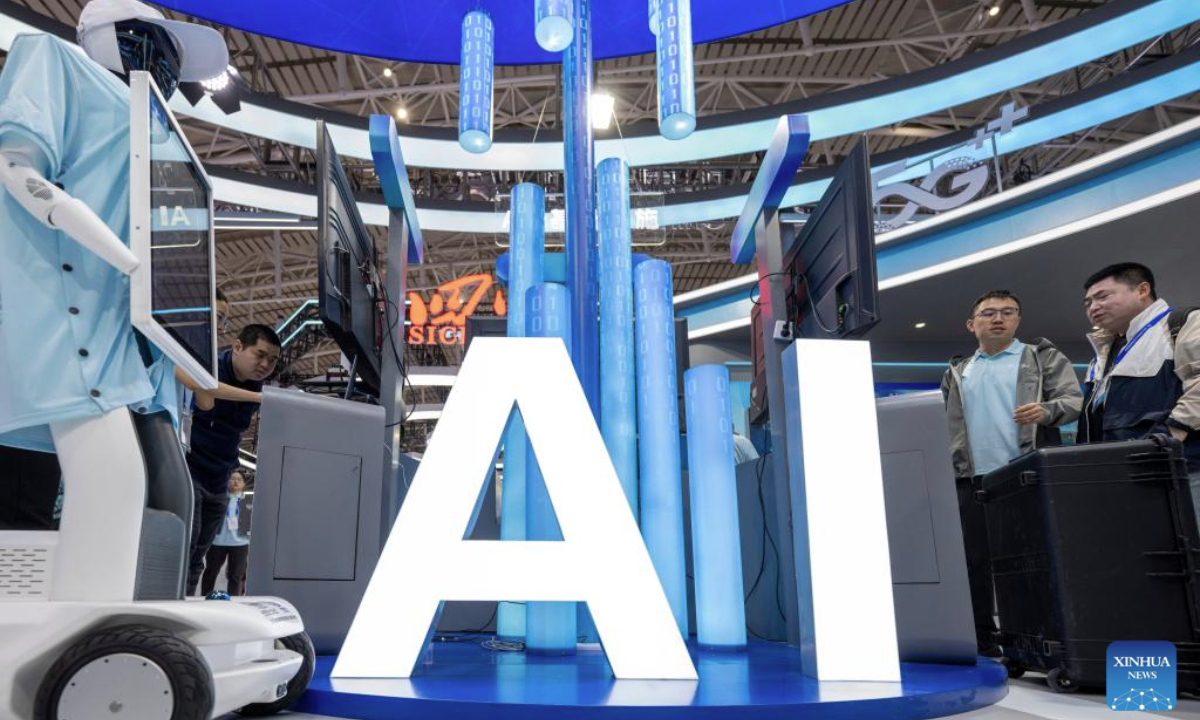 People visit the 34th Harbin International Economic and Trade Fair in Harbin, capital of northeast China's Heilongjiang Province, May 19, 2025. The fair showcased cutting-edge technologies such as autonomous driving, commercial satellites and humanoid robots from over 100 tech firms. (Xinhua/Zhang Tao)