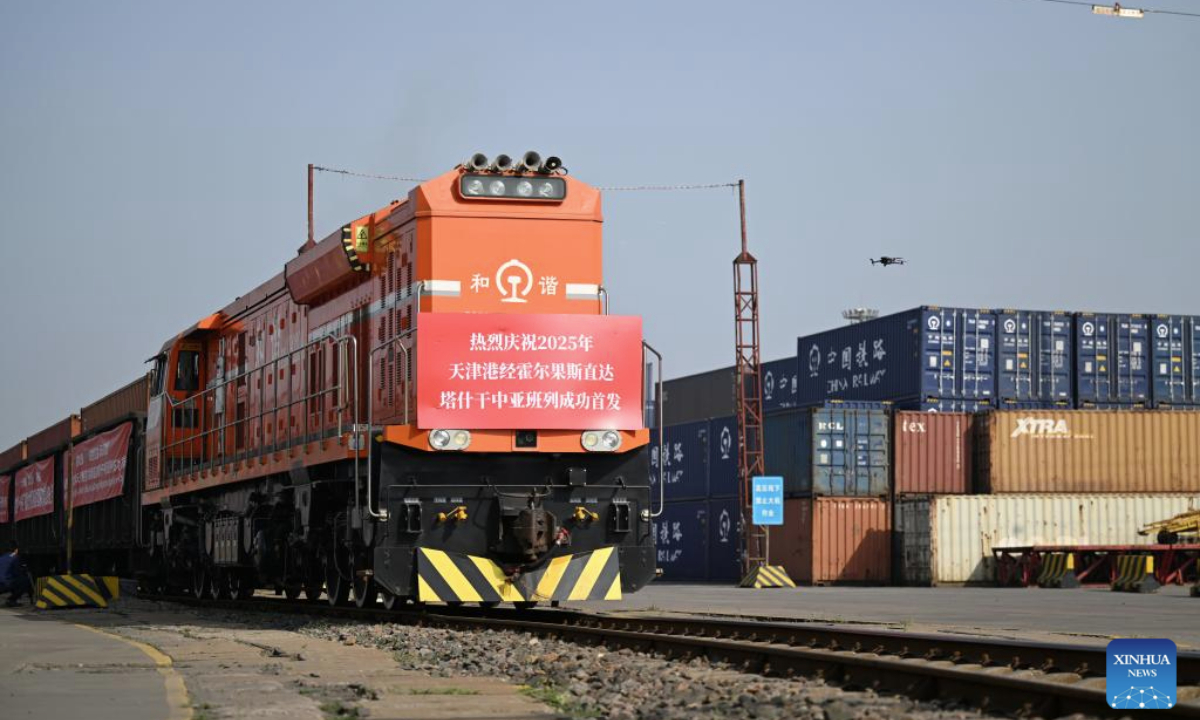 A China-Central Asia freight train bound for Tashkent via Horgos departs from a station in Tianjin Port in north China's Tianjin, May 20, 2025. The first China-Central Asia freight train from Tianjin Port to Tashkent via Horgos in 2025 departed here on Tuesday, sending fifty containers of auto parts, mechanical equipment, building materials and household appliances to Uzbekistan's capital. (Xinhua/Zhao Zishuo)